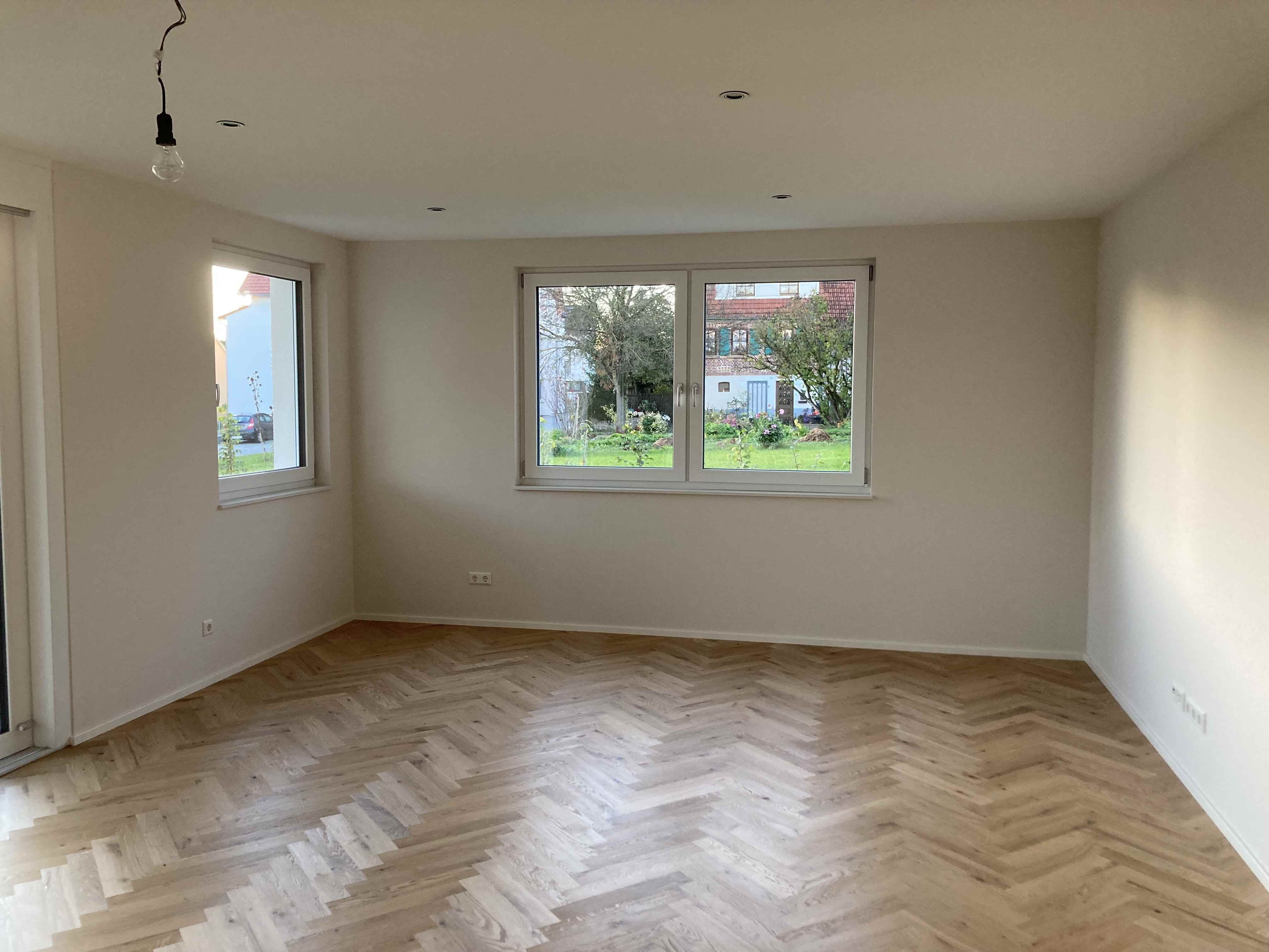 7-Familienhaus Walddorfhäslach 2022: Modernes Wohnzimmer
